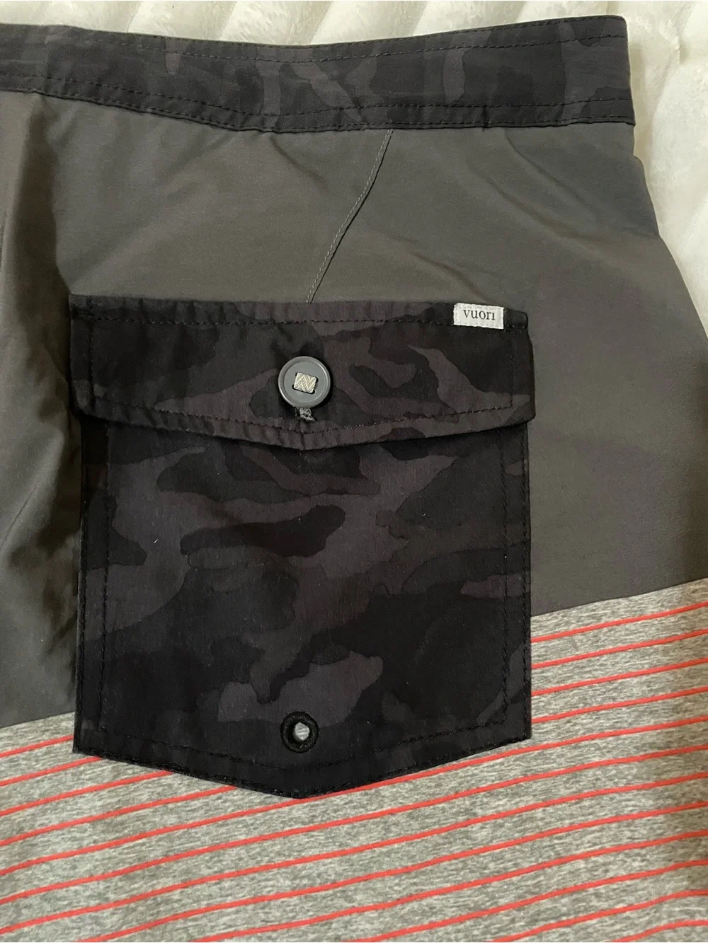Vuori Men's Swim Shorts in Black with Dusty Rose Accent